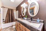 Lower Bathroom with double sinks